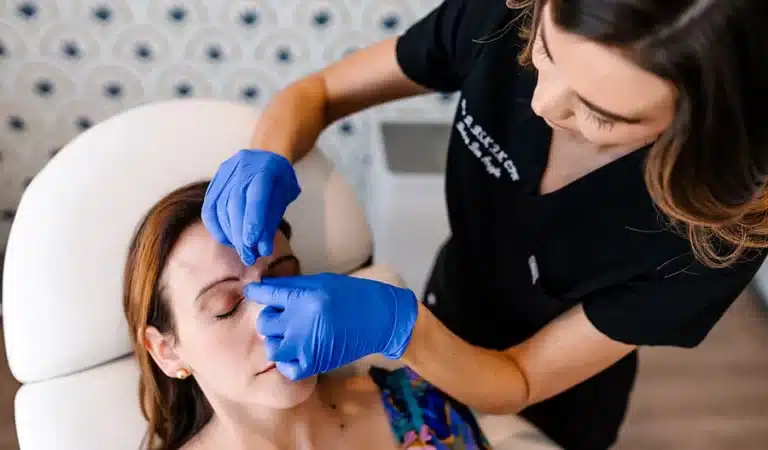 Clean, professional medical spa treatment room with neutral tones at InjectCo MedSpa Plano in Plano