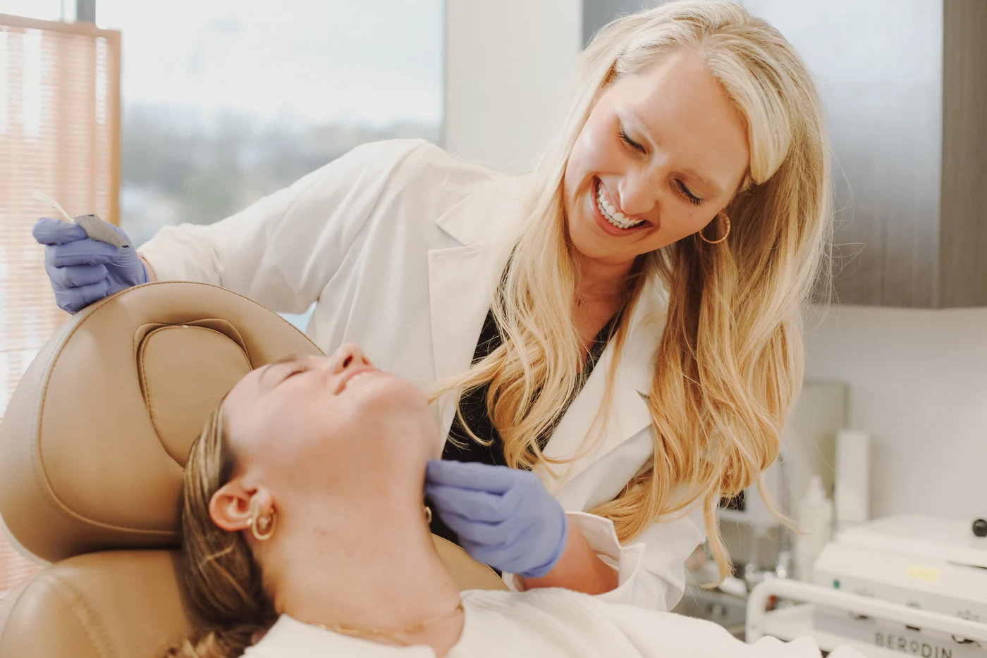 Nurse consultation mapping a full facial balancing plan at InjectCo MedSpa Nurse consultation mapping a full facial balancing plan at InjectCo MedSpa