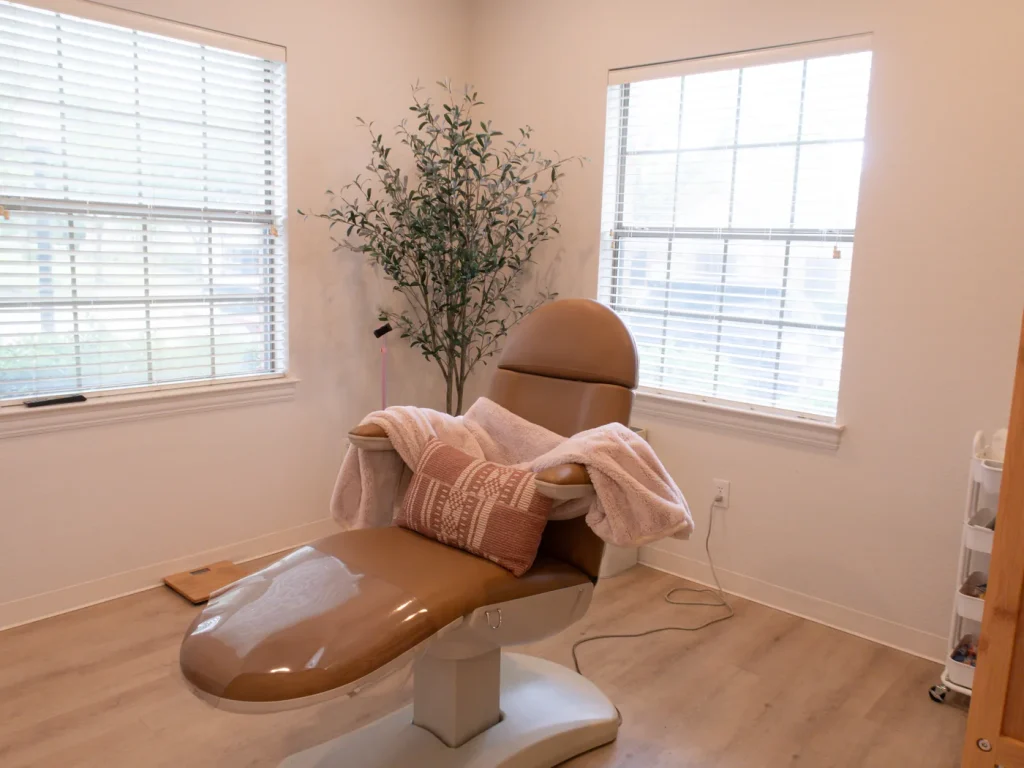 Private treatment room with a reclining chair at an InjectCo MedSpa clinic