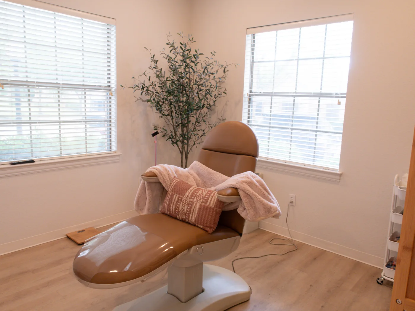A private treatment room with a reclining chair at InjectCo MedSpa Austin