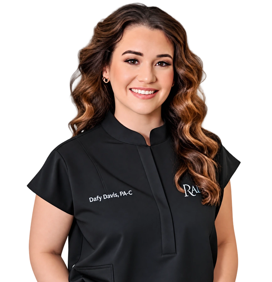 shelby, PA-C smiling in black medical scrubs