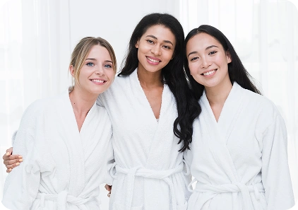 InjectCo Austin med spa team posing together in the clinic